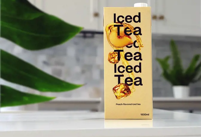iced tea in an aseptic carton on a counter at home